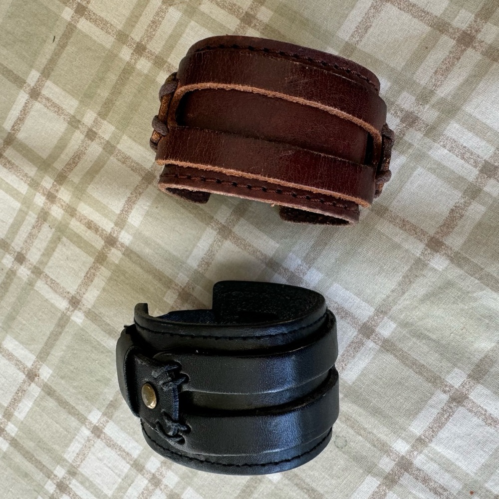 Two leather cuffs in black and brown - genuine leather, two snap adjustable